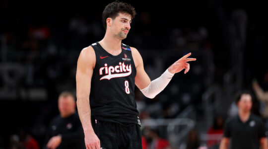Deni Avdija of the Portland Trail Blazers reacts in the final minutes of a 127-113 win over the Atlanta Hawks on April 1, 2025. (Kevin C. Cox/Getty Images)